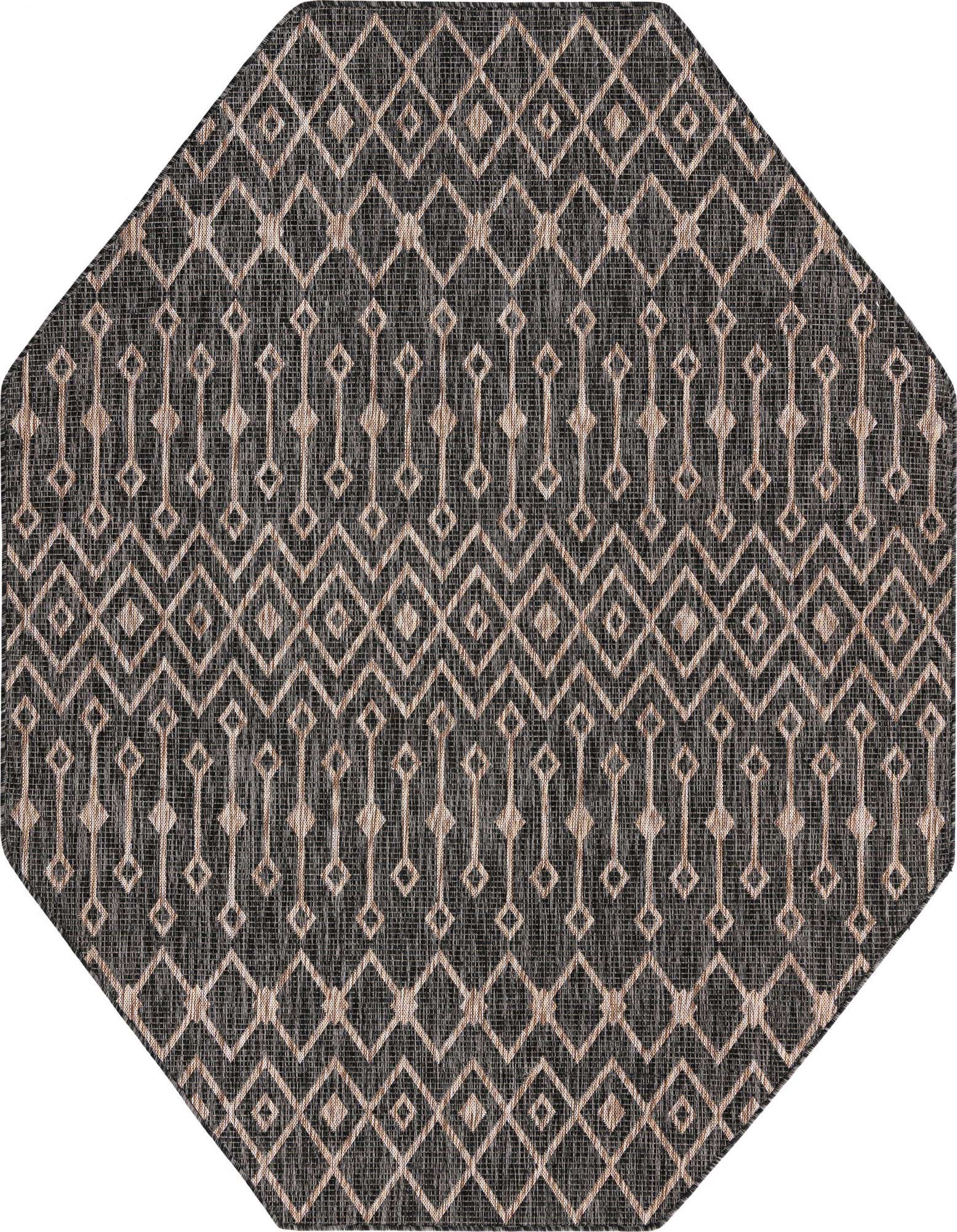 Octagon-shaped black and beige tribal patterned outdoor rug with a flatweave texture, suitable for a patio.