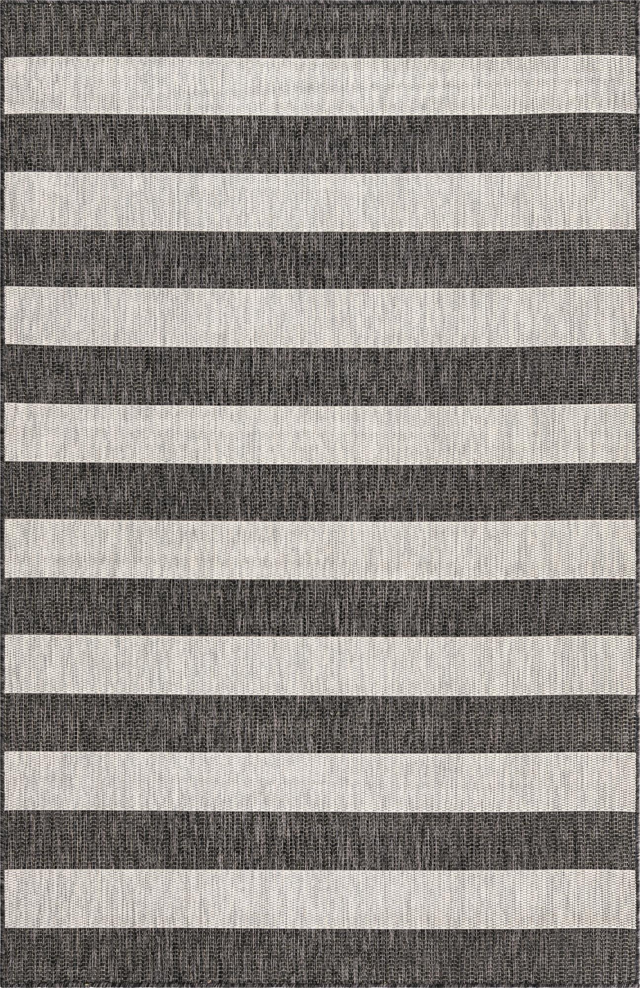 A 5x8 rectangular black and white striped rug with a flatweave texture, suitable for indoor or outdoor use.