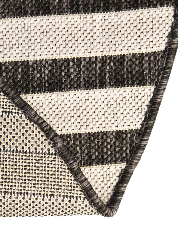 Detail image of 2' 7 x 4' Washable Ribbon Indoor / Outdoor Hearth Rug