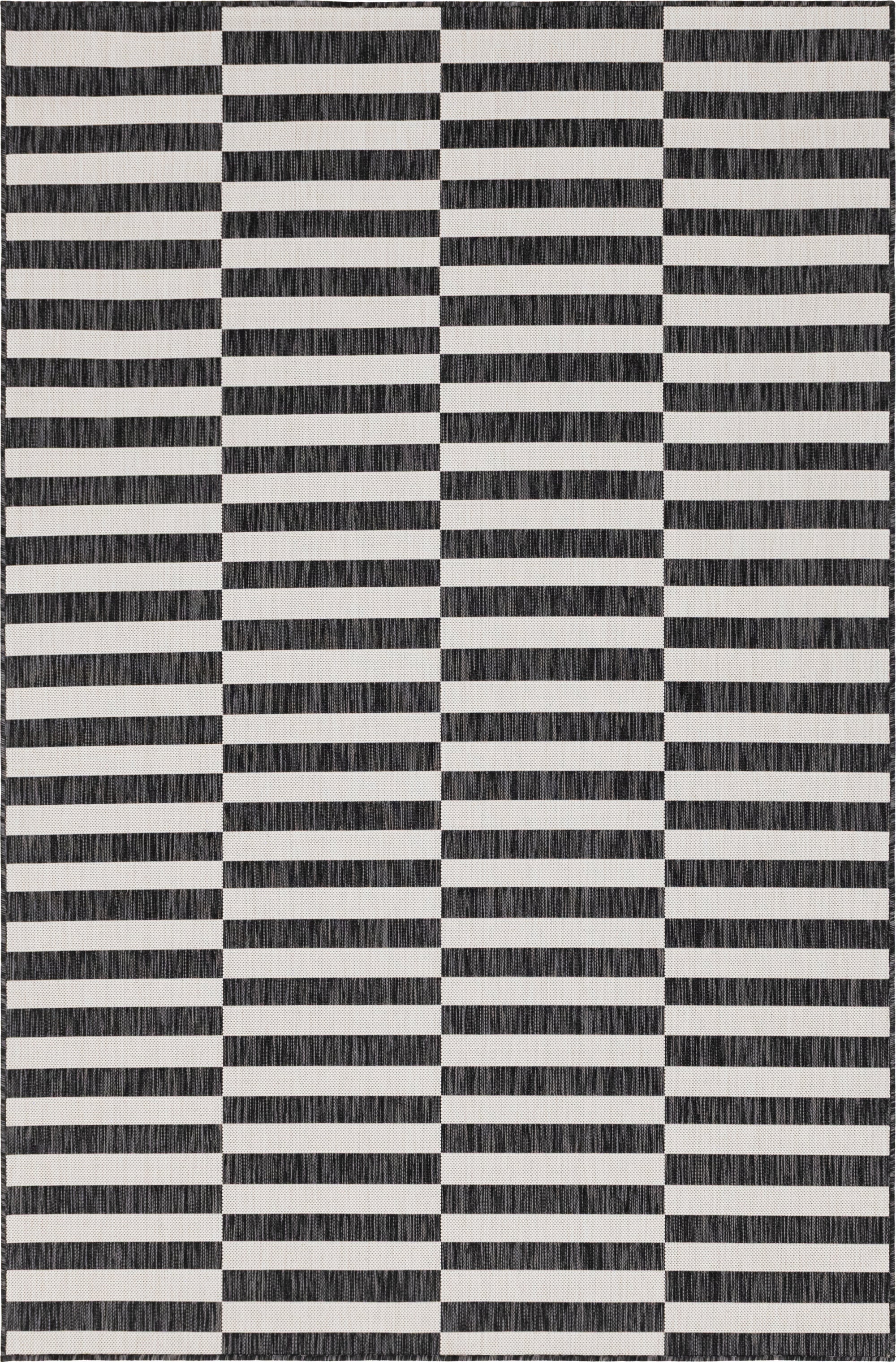A 6x9 rectangular Rugs.com Outdoor Ribbon rug featuring a bold black and white horizontal stripe pattern, ideal for a modern patio or living room.