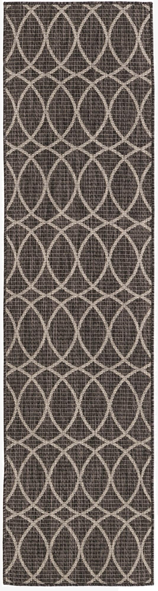 A black 8 ft runner rug with a modern white trellis pattern, suitable for indoor or outdoor use.