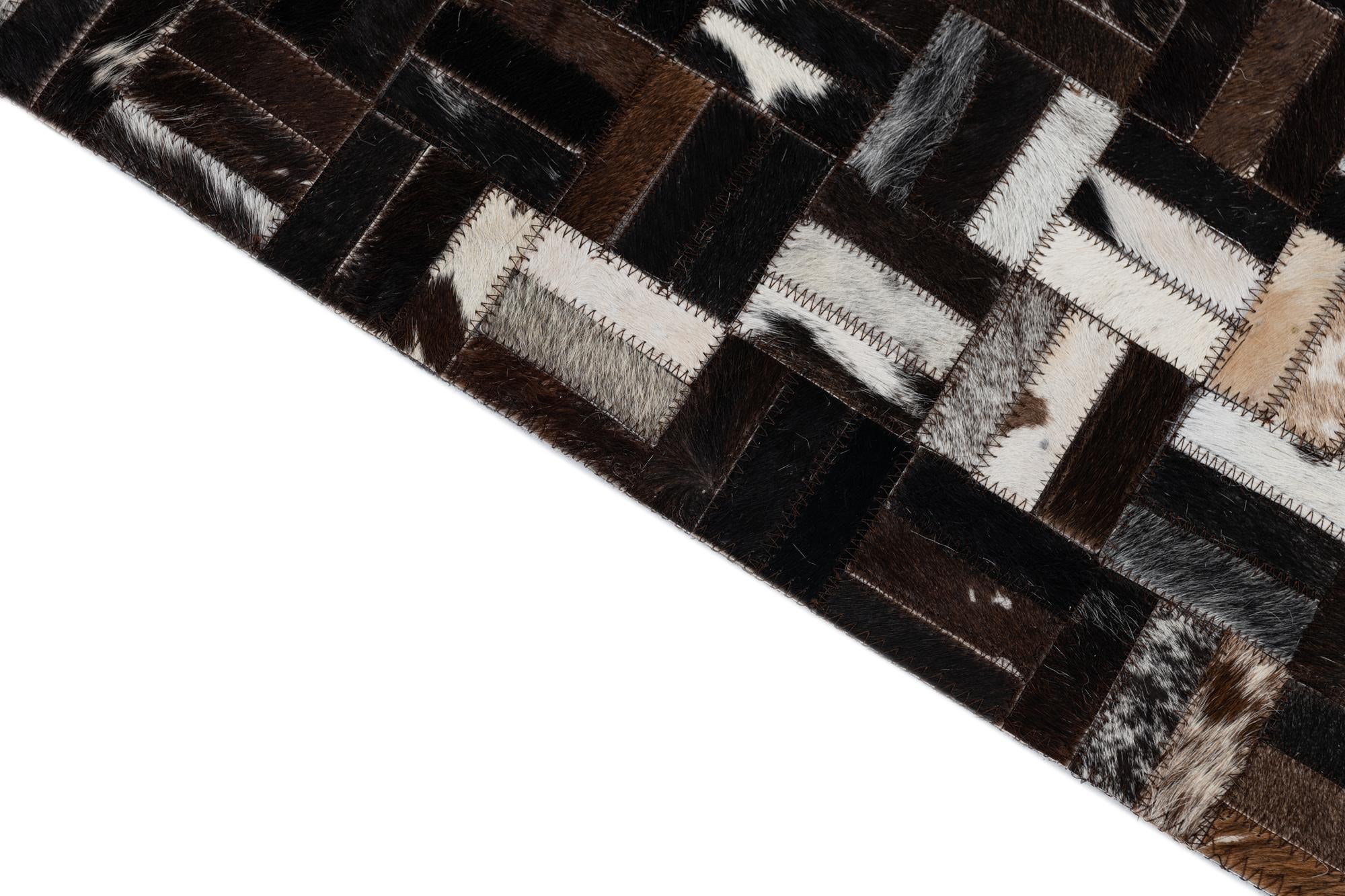 2' 1 x 3' Cowhide Leather Rug
