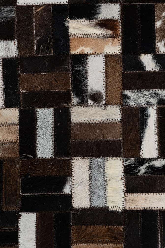 2' 1 x 3' Cowhide Leather Rug