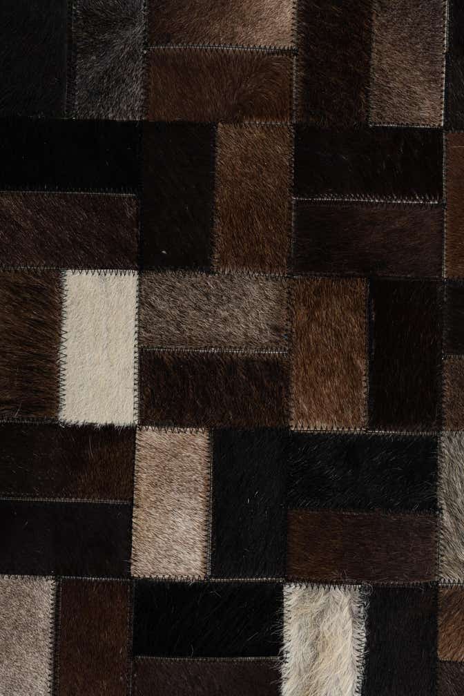 5' x 7' 9 Cowhide Leather Rug