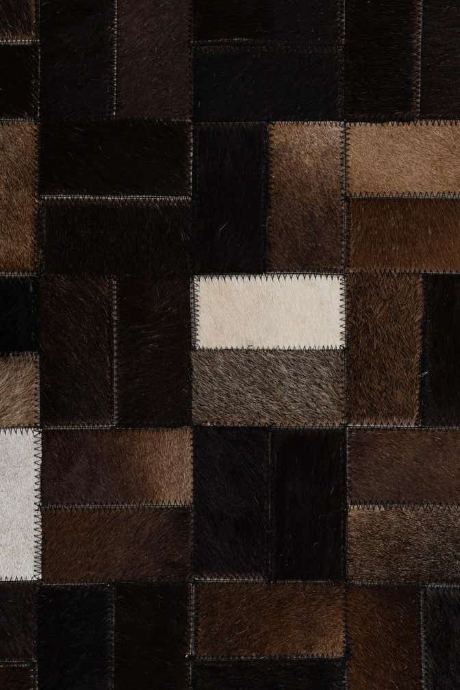 5' x 7' 9 Cowhide Leather Rug