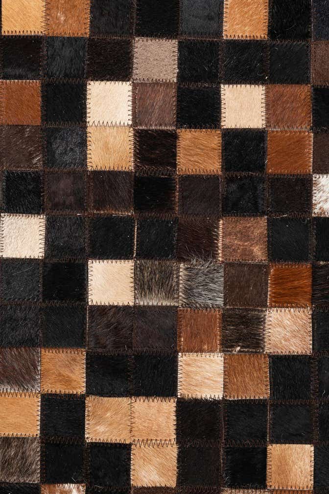 5' x 7' 9 Cowhide Leather Rug