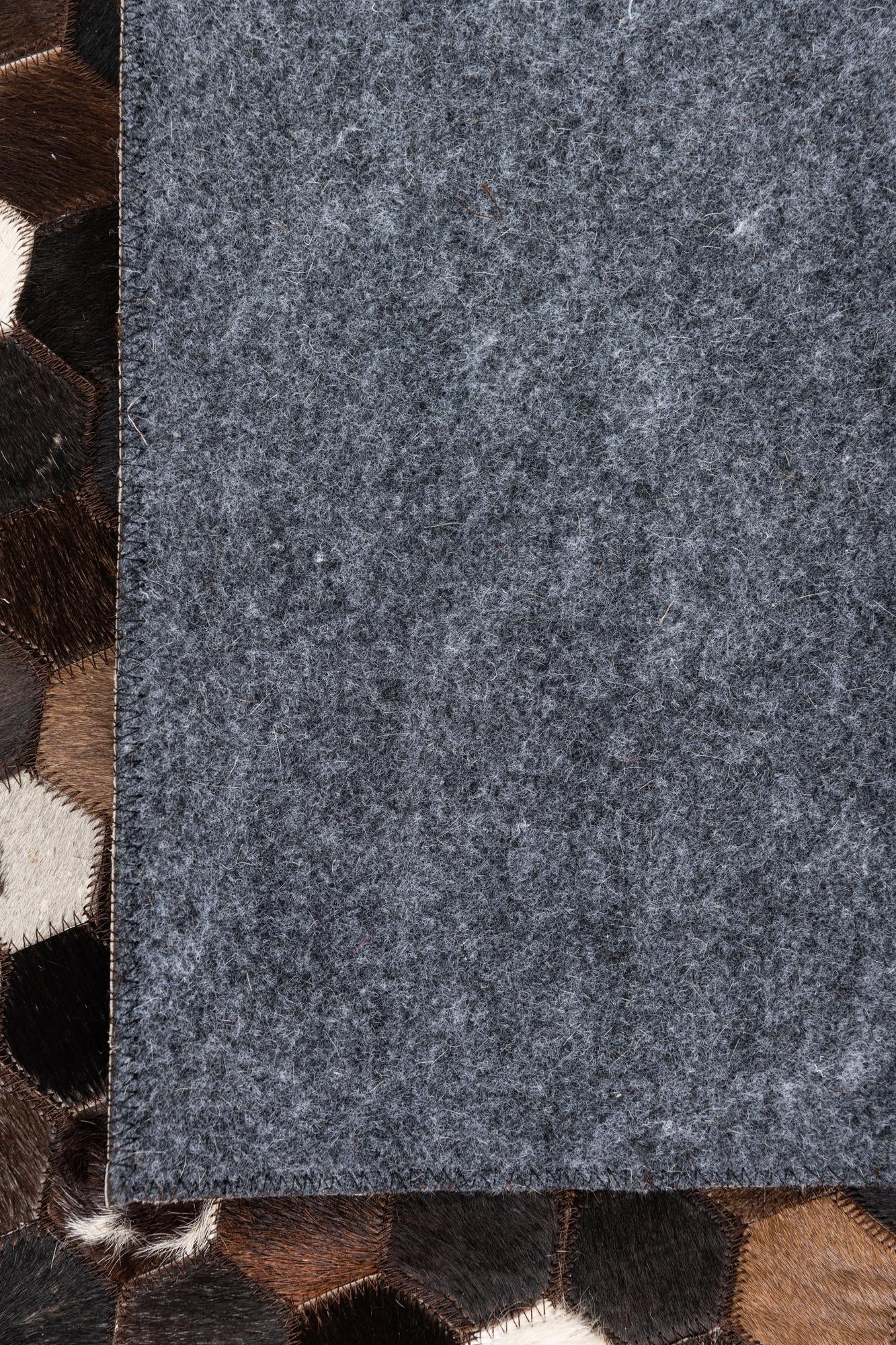 5' 2 x 7' 9 Cowhide Leather Rug