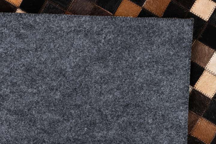 5' 1 x 8' 1 Cowhide Leather Rug