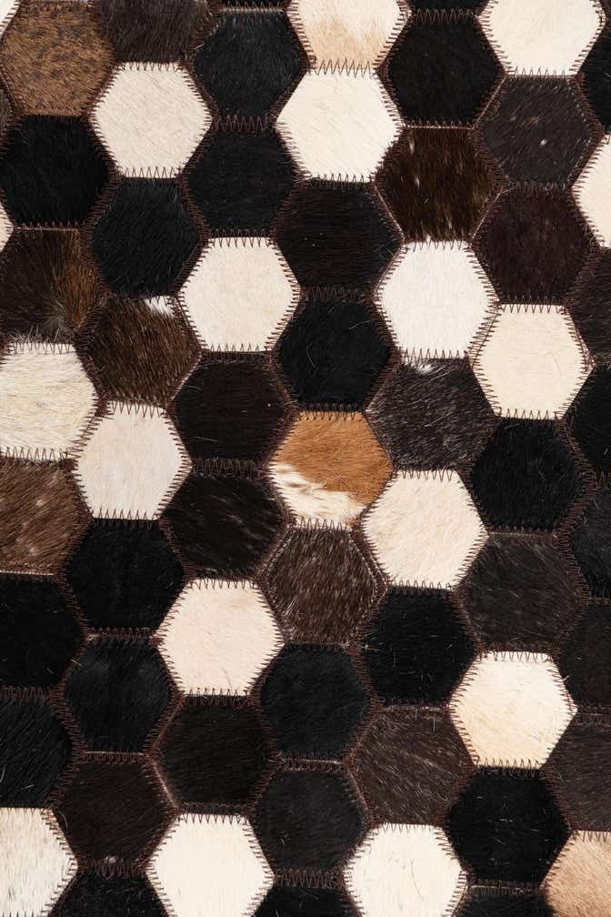 5' 1 x 8' 1 Cowhide Leather Rug