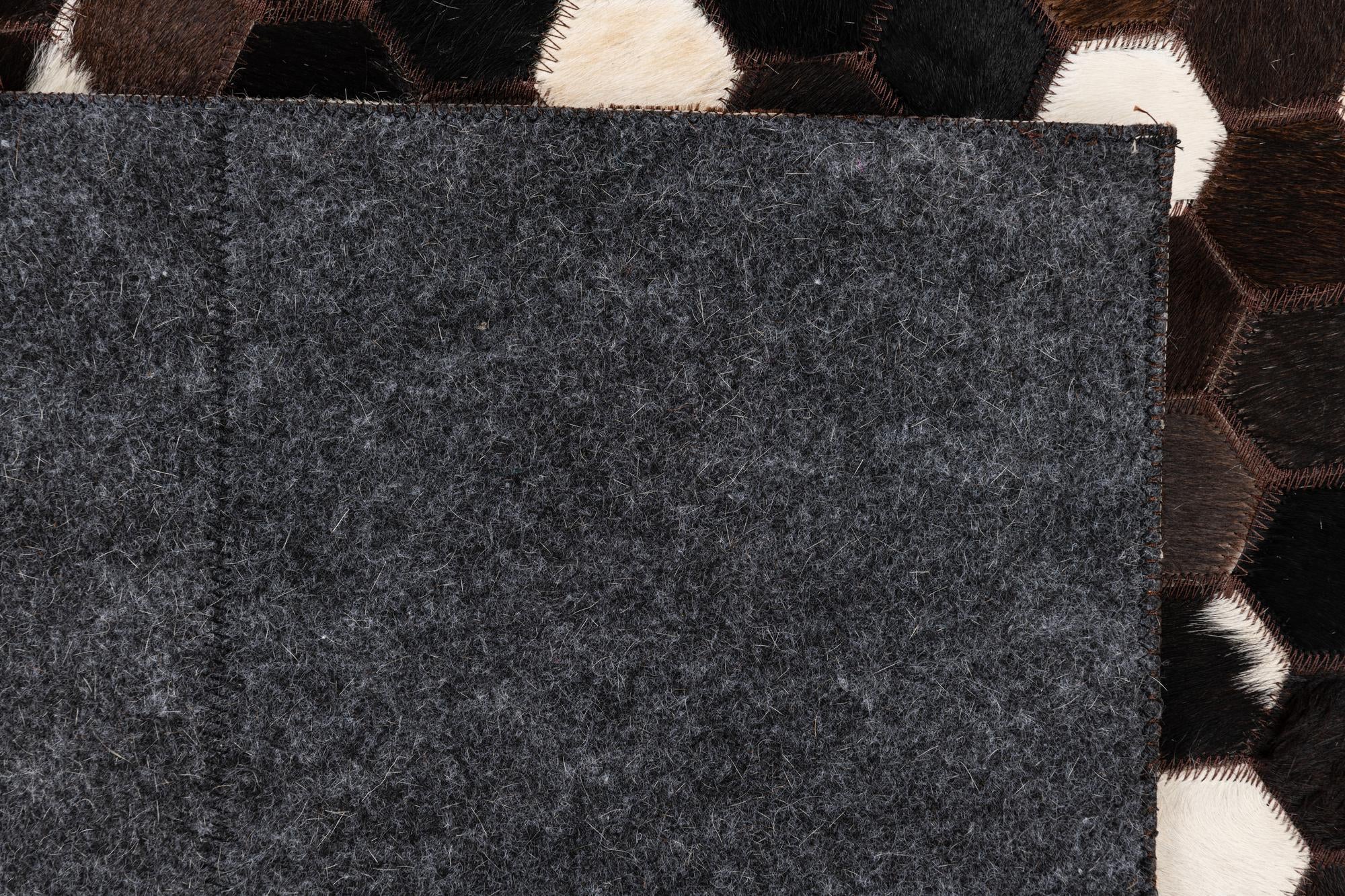 5' 1 x 8' 1 Cowhide Leather Rug