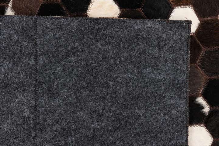 5' 1 x 8' 1 Cowhide Leather Rug