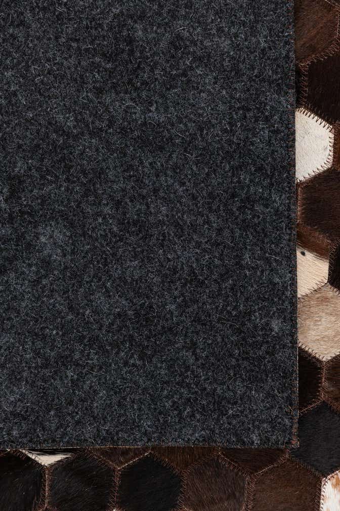 5' 1 x 8' 1 Cowhide Leather Rug