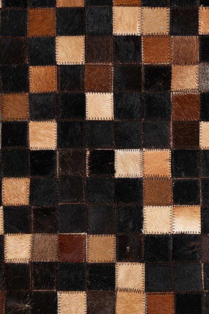 5' 1 x 7' 10 Cowhide Leather Rug