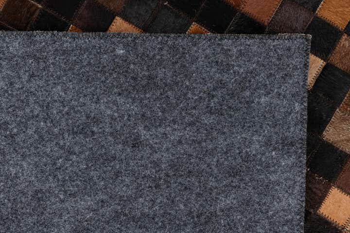 5' 1 x 7' 10 Cowhide Leather Rug
