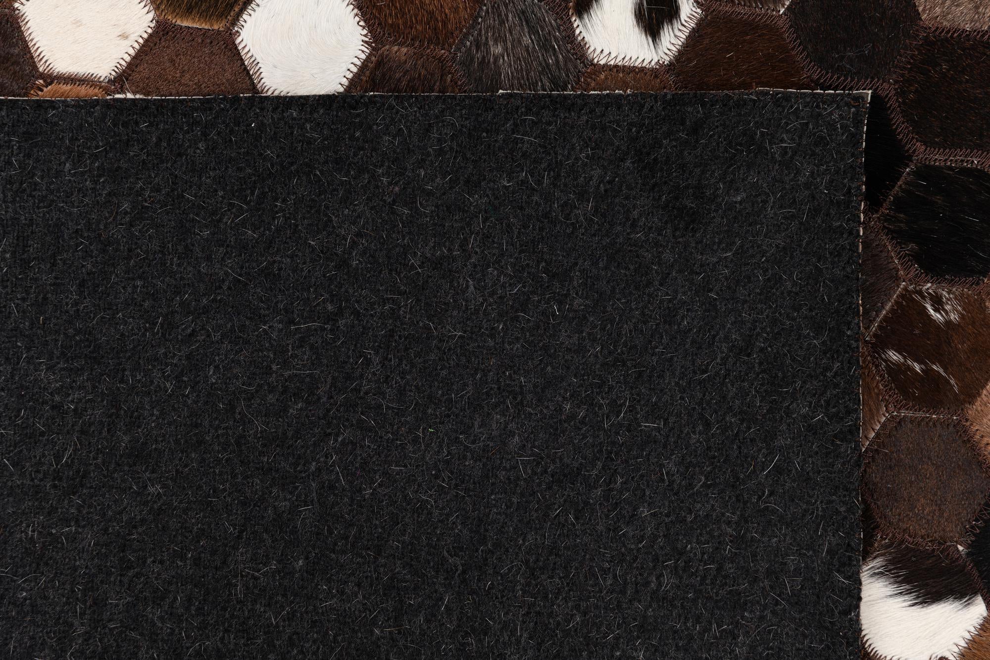 5' 1 x 8' 1 Cowhide Leather Rug