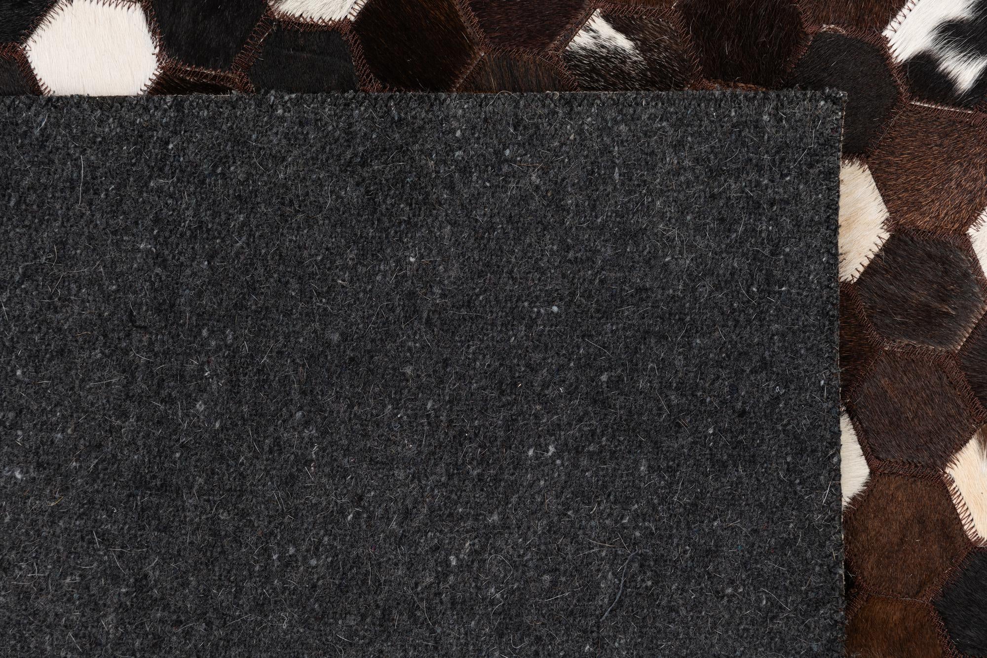 5' 1 x 8' 1 Cowhide Leather Rug