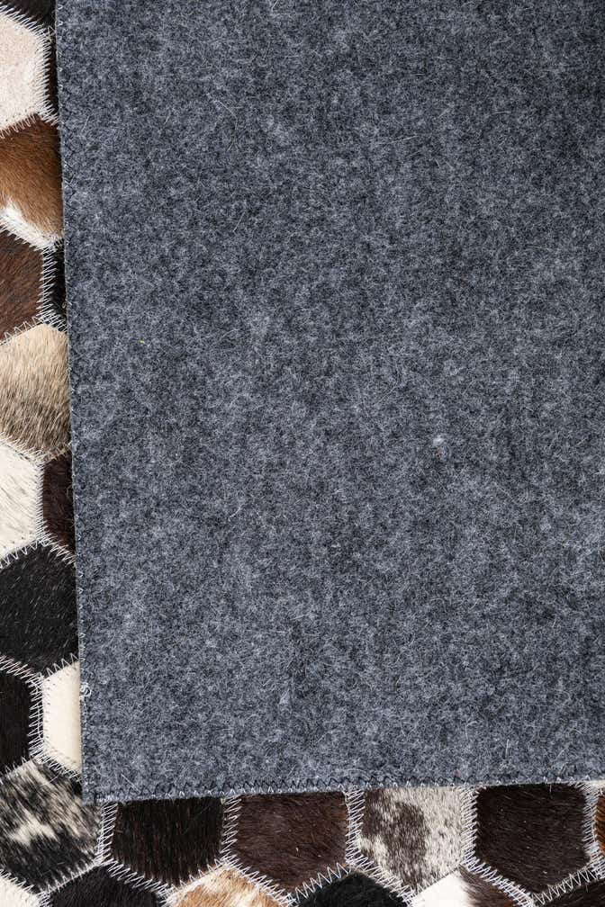 5' x 7' 9 Cowhide Leather Rug