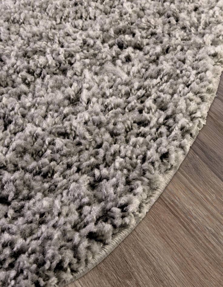 Detail image of 5' 3 x 8' Solid Shag Oval Rug