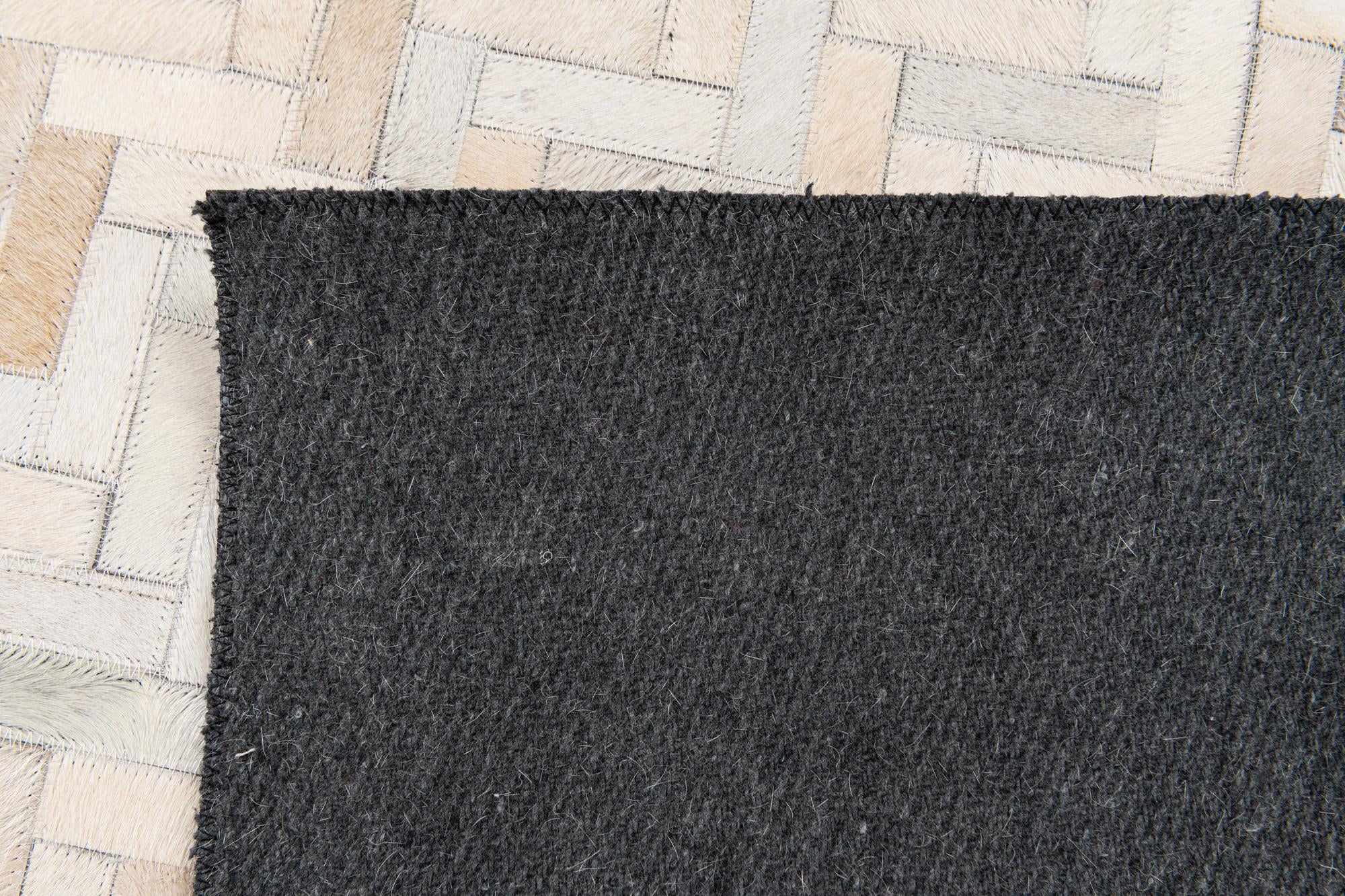 4' 10 x 7' 10 Cowhide Stocks Rug
