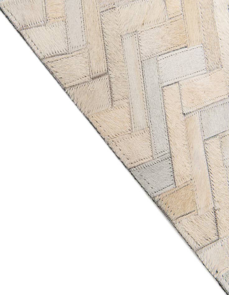 Detail image of 4' 10 x 7' 10 Cowhide Stocks Rug