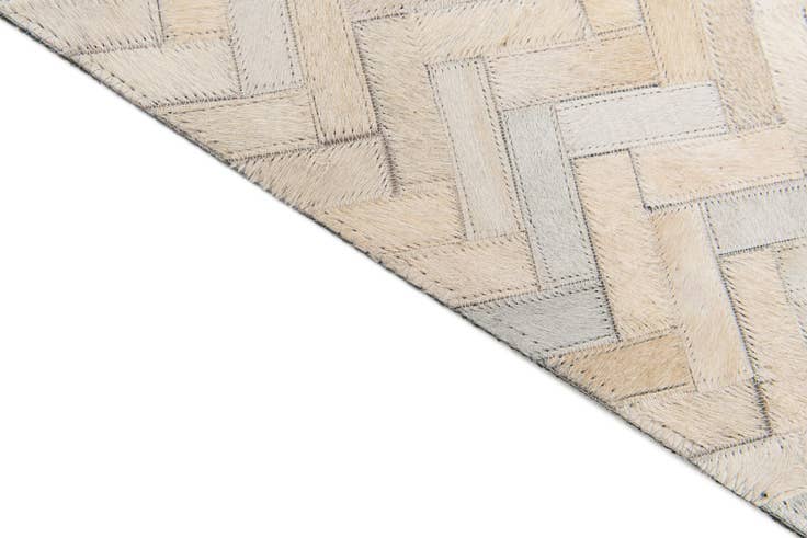 Detail image of 4' 10 x 7' 10 Cowhide Stocks Rug