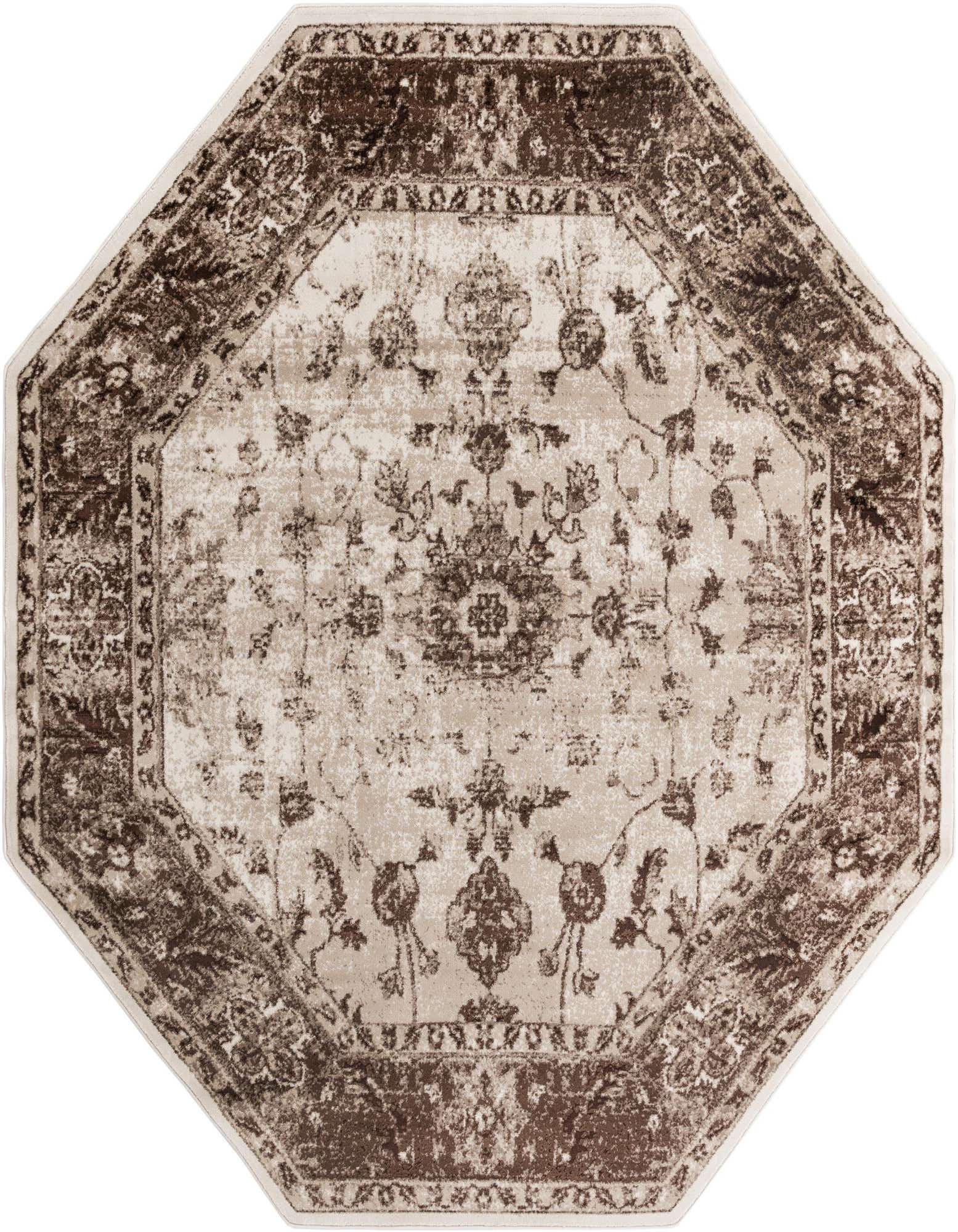 An octagon-shaped Nepal Collection rug, 7'10 x 7'10, featuring a distressed traditional floral pattern in ivories, creams, and dark brown.