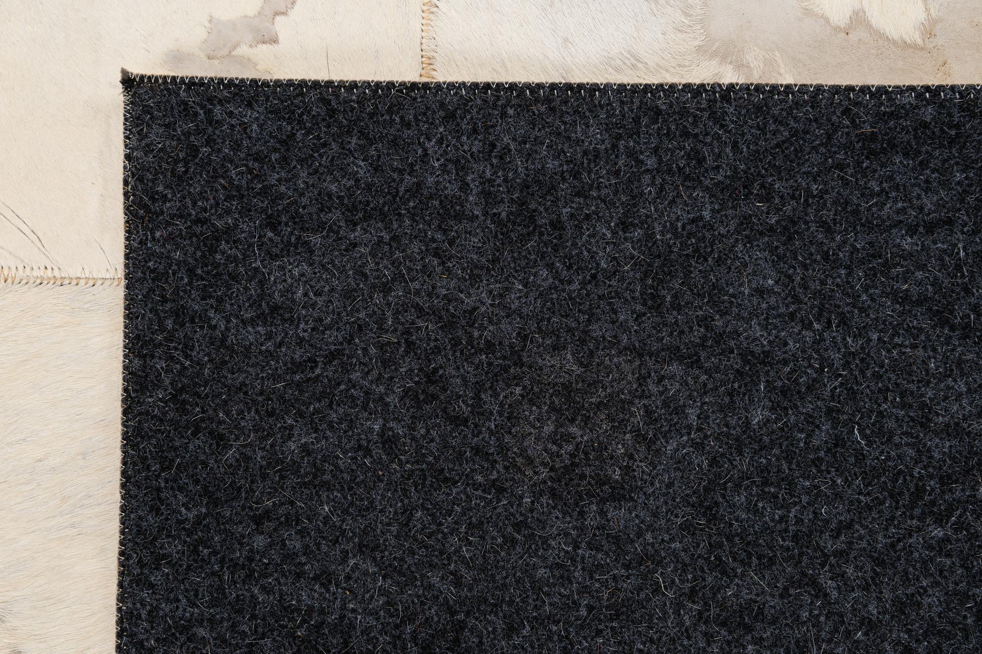 5' 2 x 7' 11 Cowhide - Patchwork Rug