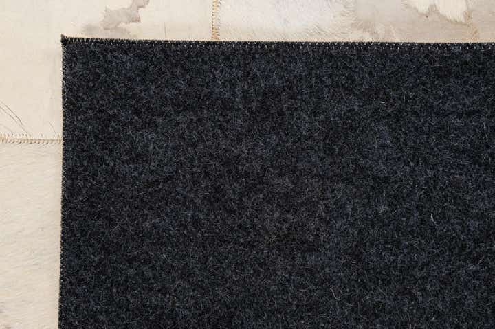 5' 2 x 7' 11 Cowhide - Patchwork Rug