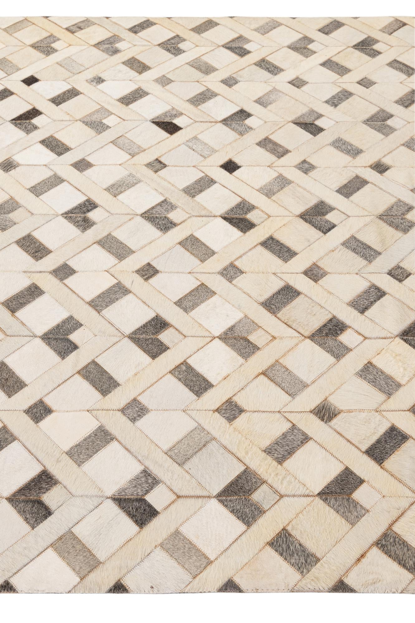 5' 3 x 8' 4 Cowhide - Patchwork Rug