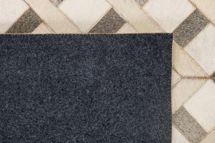 5' 3 x 8' 4 Cowhide - Patchwork Rug