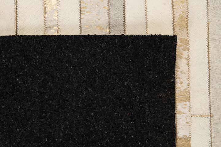 5' 3 x 7' 11 Cowhide - Patchwork Rug