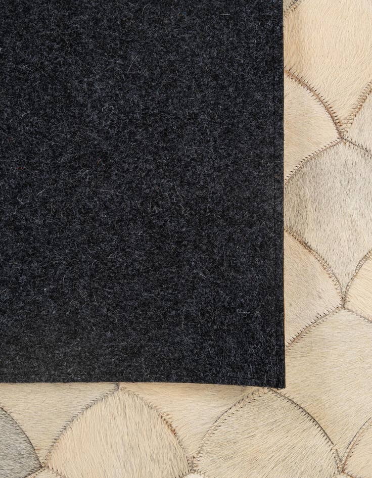 Detail image of 5' x 7' 11 Cowhide - Patchwork Rug