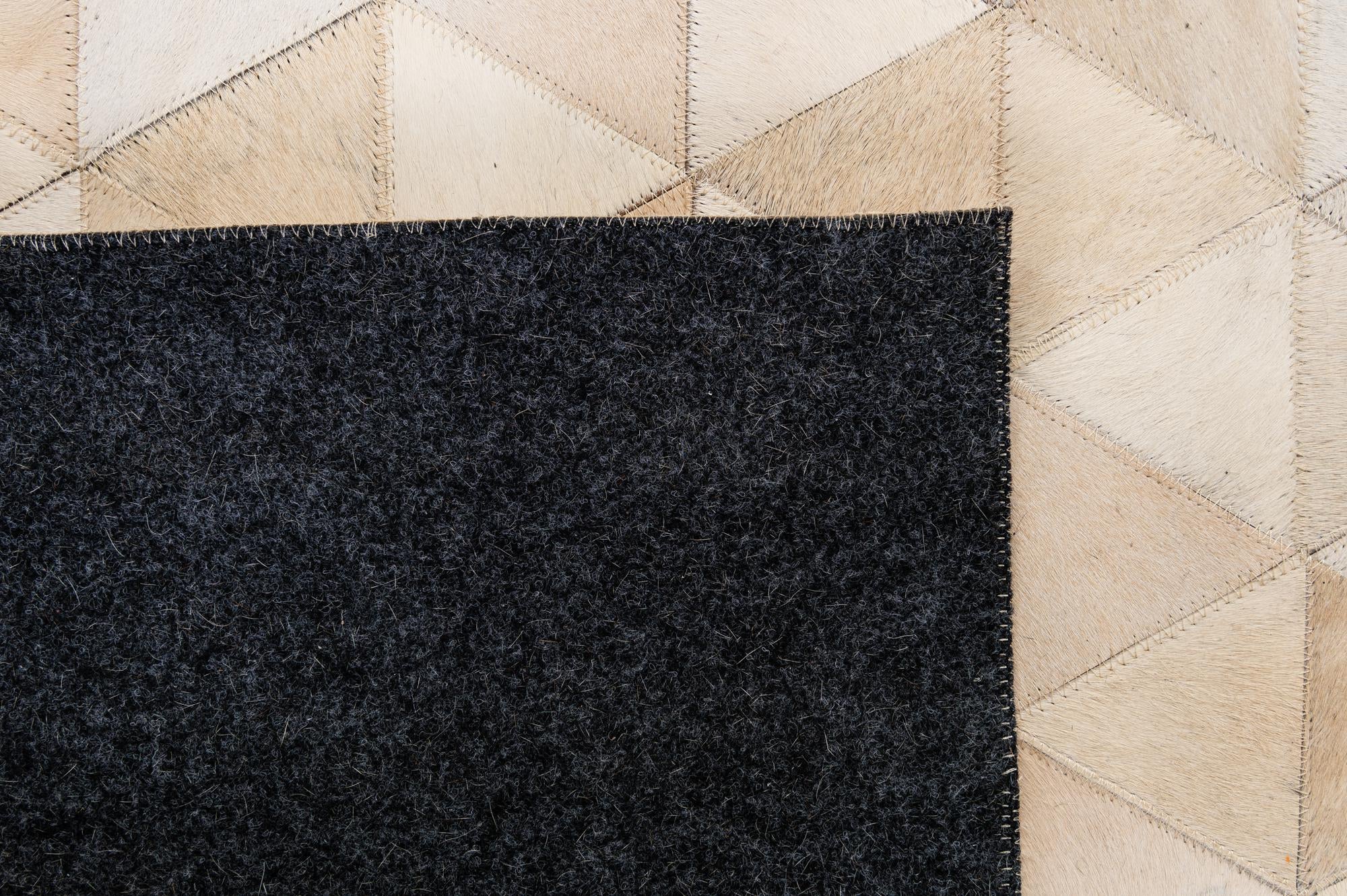 5' 2 x 8' 2 Cowhide - Patchwork Rug