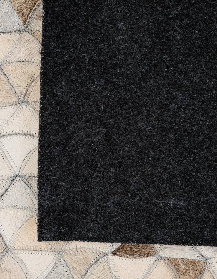 Detail image of 4' 11 x 7' 11 Cowhide - Patchwork Rug