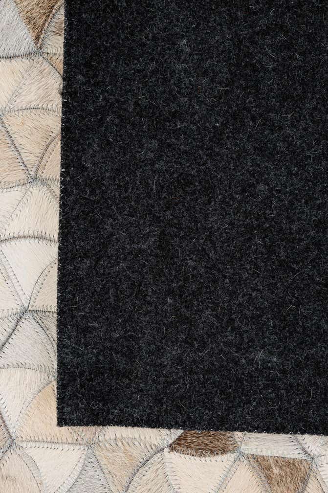 4' 11 x 7' 11 Cowhide - Patchwork Rug