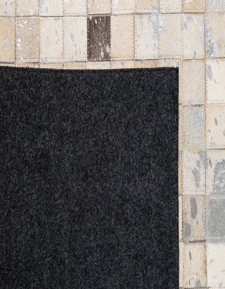 Detail image of 5' 1 x 8' Cowhide - Patchwork Rug