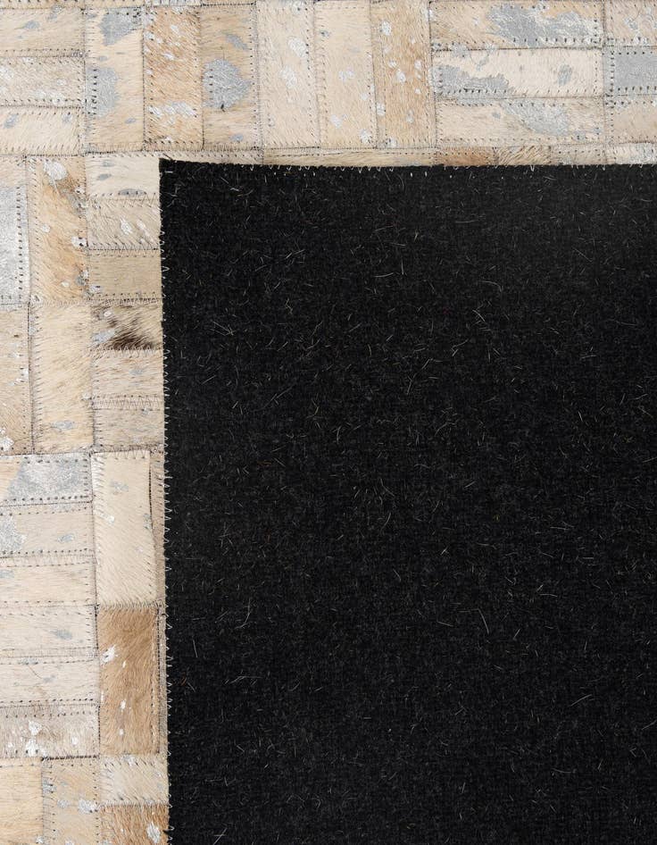 Detail image of 4' 11 x 8' Cowhide - Patchwork Rug