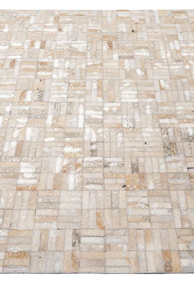 4' 11 x 7' 9 Cowhide - Patchwork Rug