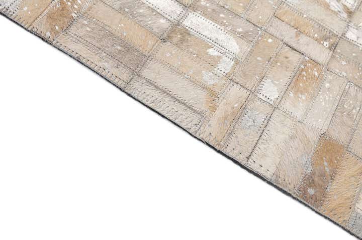 4' 11 x 7' 9 Cowhide - Patchwork Rug