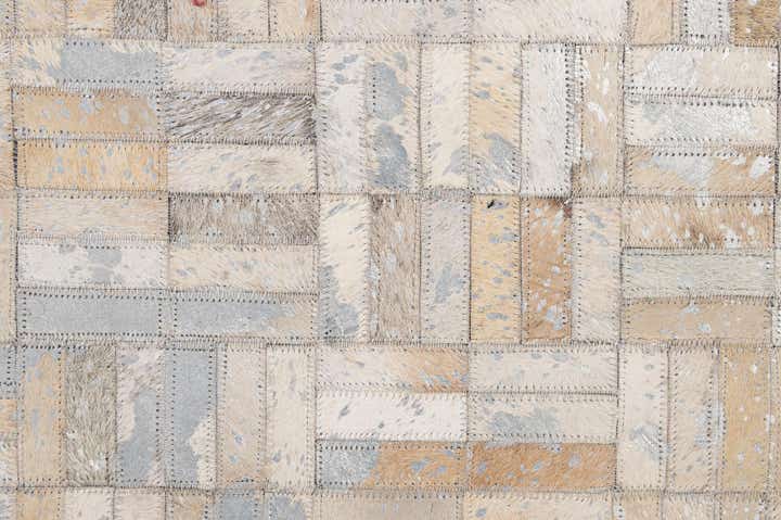 4' 11 x 7' 9 Cowhide - Patchwork Rug