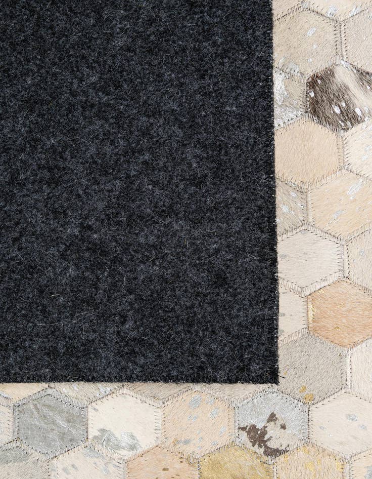 Detail image of 5' 1 x 8' Cowhide - Patchwork Rug