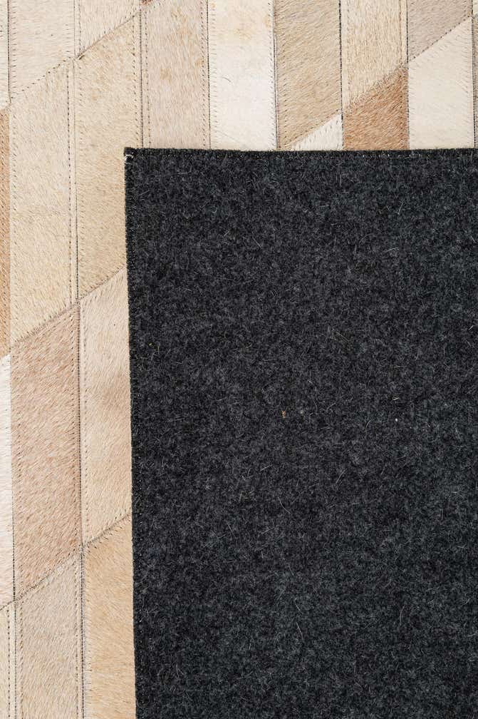 5' 1 x 7' 11 Cowhide - Patchwork Rug