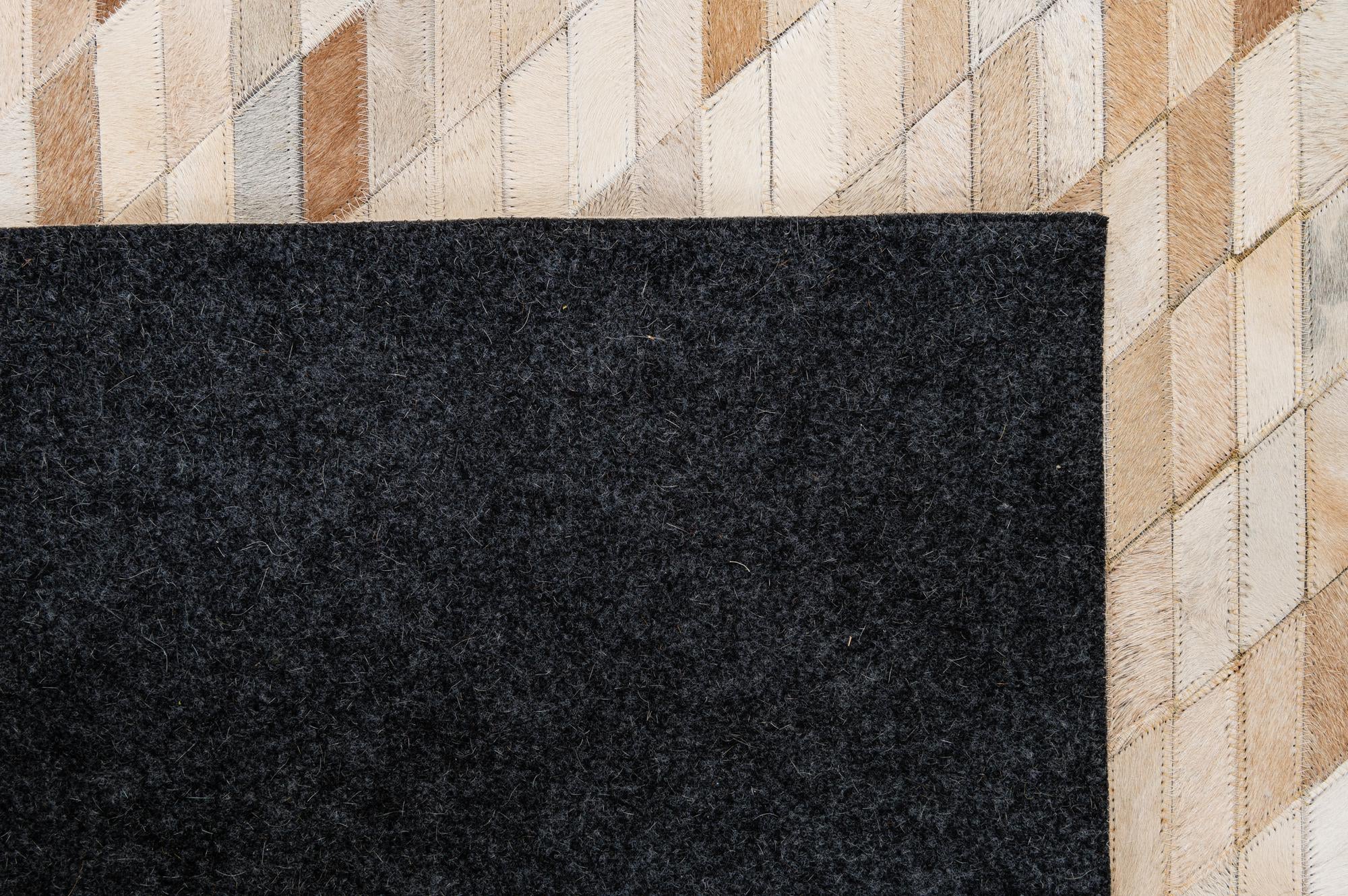 5' 1 x 7' 11 Cowhide - Patchwork Rug