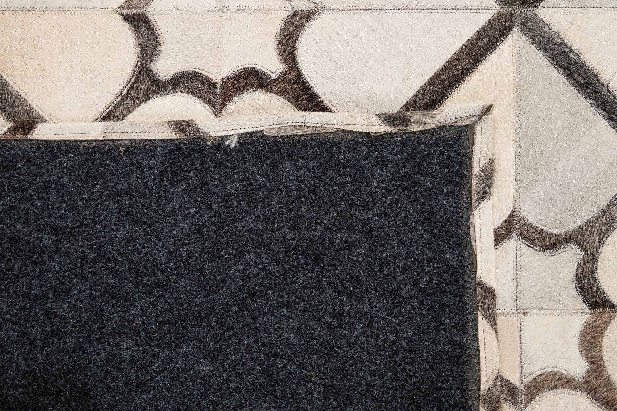 5' x 7' 11 Cowhide - Patchwork Rug