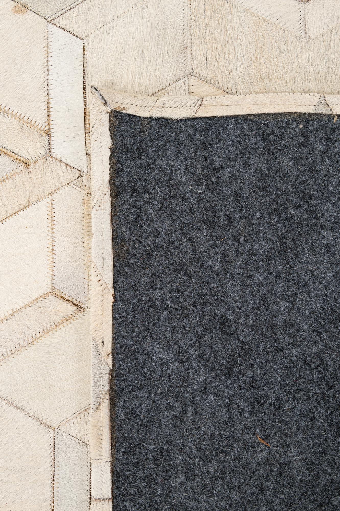 5' 1 x 7' 11 Cowhide - Patchwork Rug