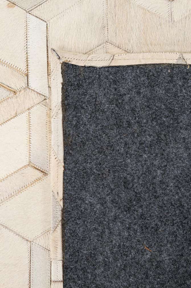 5' 1 x 7' 11 Cowhide - Patchwork Rug