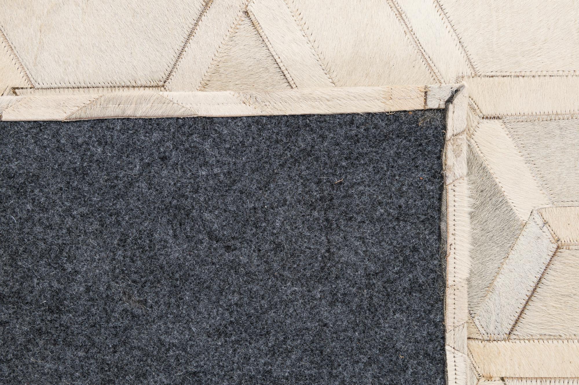 4' 11 x 7' 11 Cowhide - Patchwork Rug