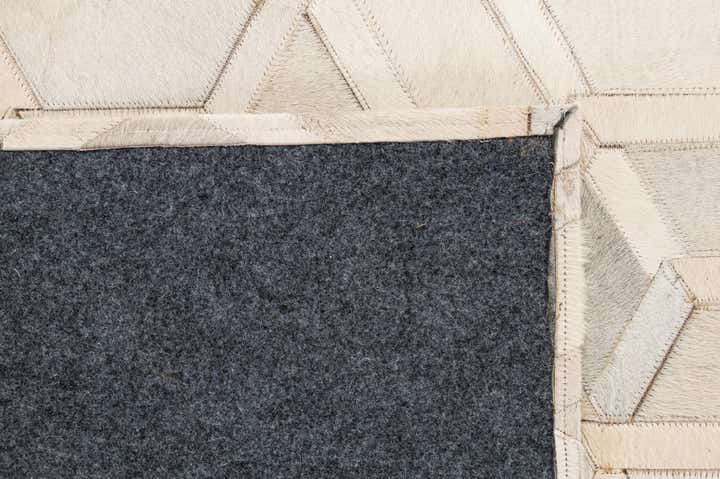 4' 11 x 7' 11 Cowhide - Patchwork Rug
