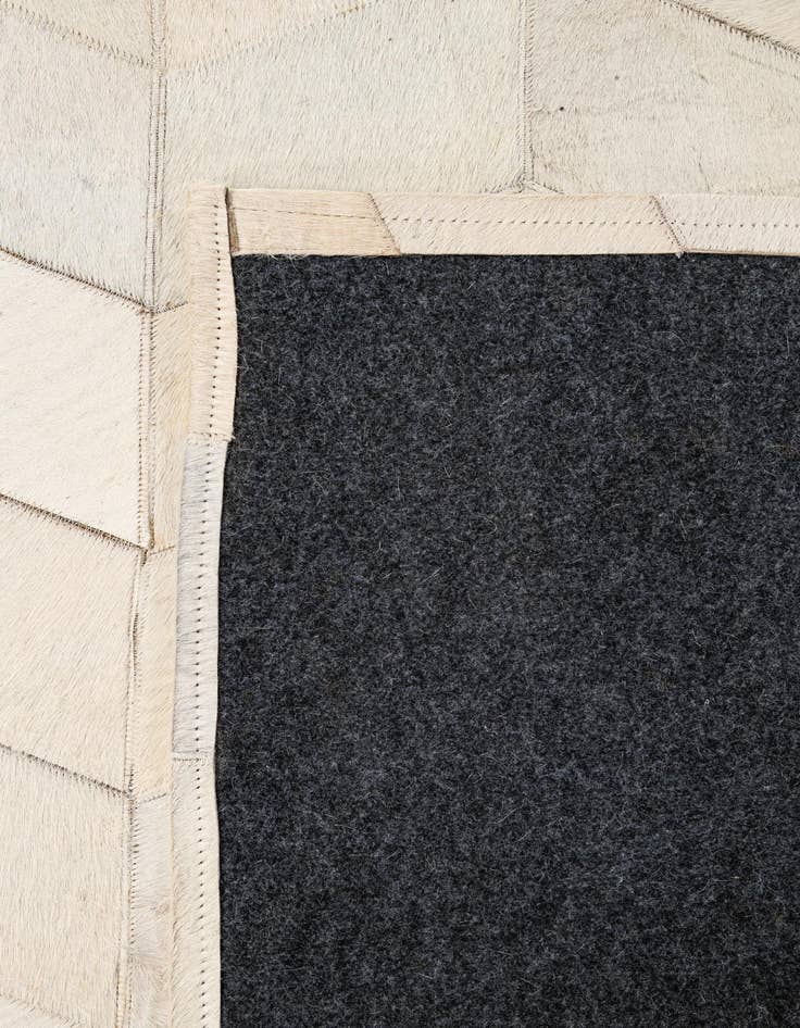 Detail image of 5' 1 x 8' Cowhide - Patchwork Rug