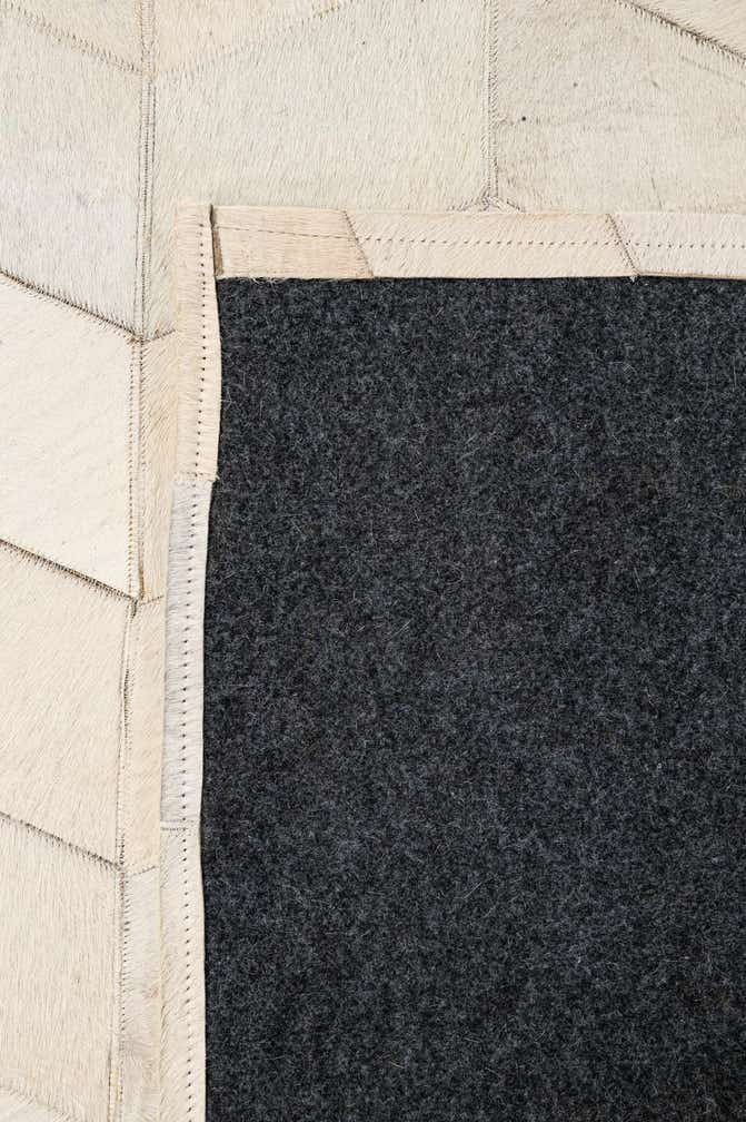 5' 1 x 8' Cowhide - Patchwork Rug